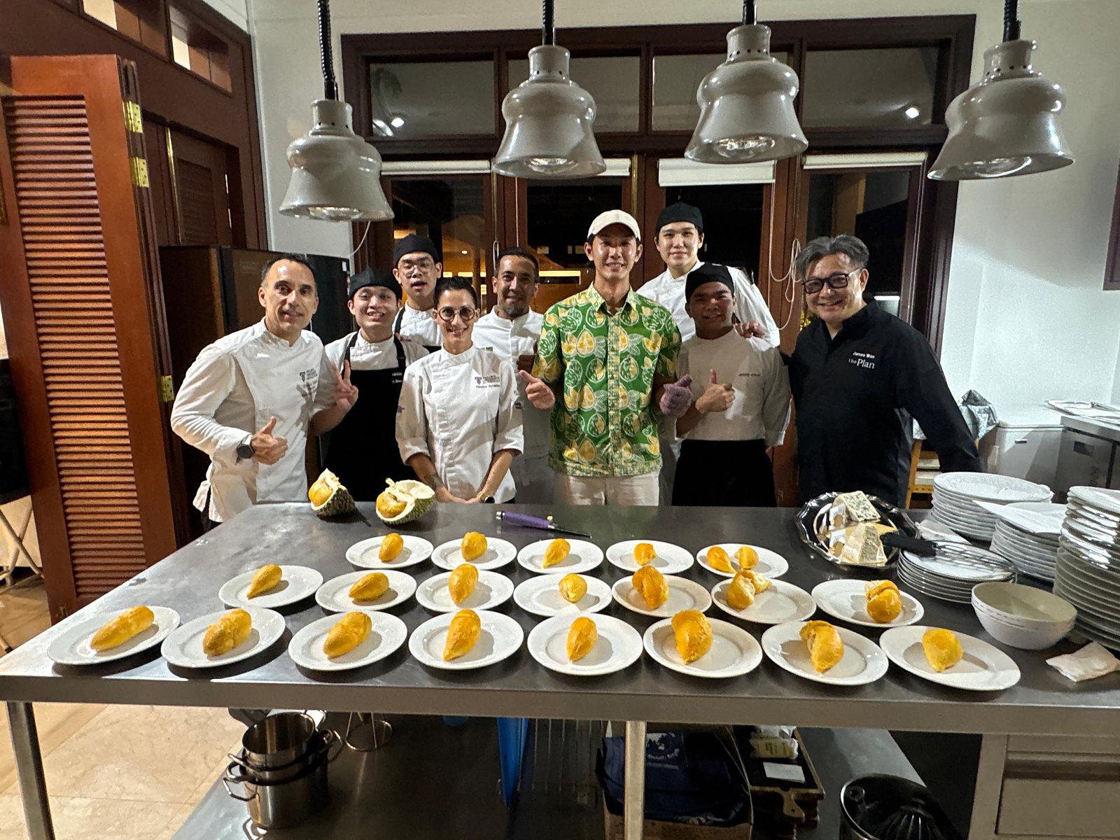 Chef James Won with the Taylor's brigade and the durian grower at close of service