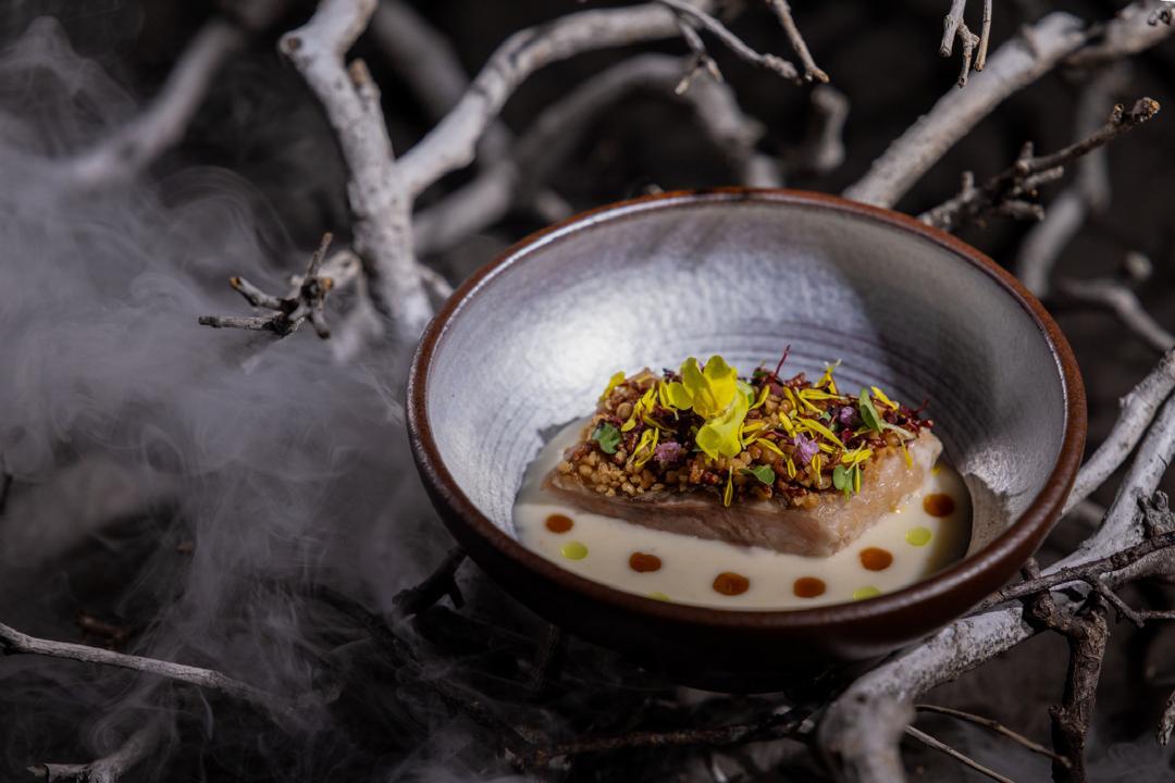 Empurau confit with a sago and hill-rice crust over a pale collagen broth, Course I River